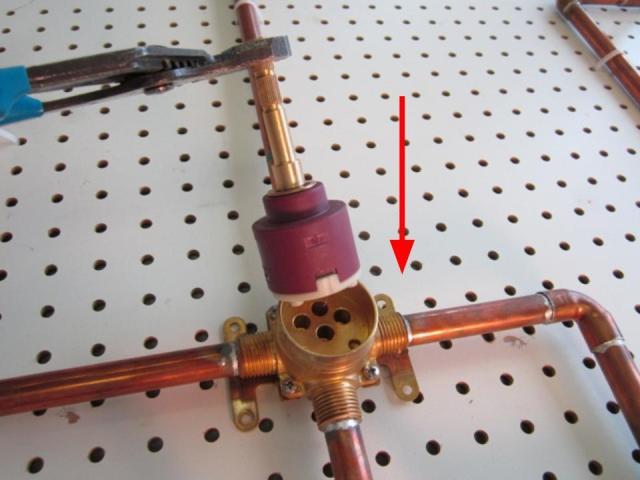 Insert the cartridge and rotate it until it slides down into place.