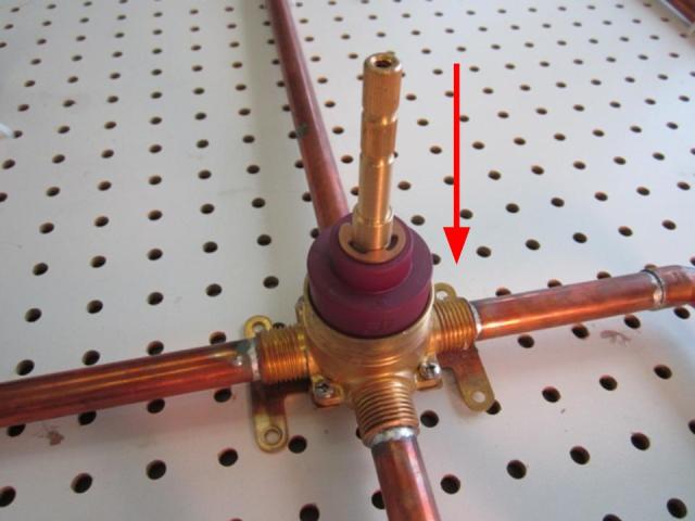 Insert the cartridge and rotate it until it slides down into place.