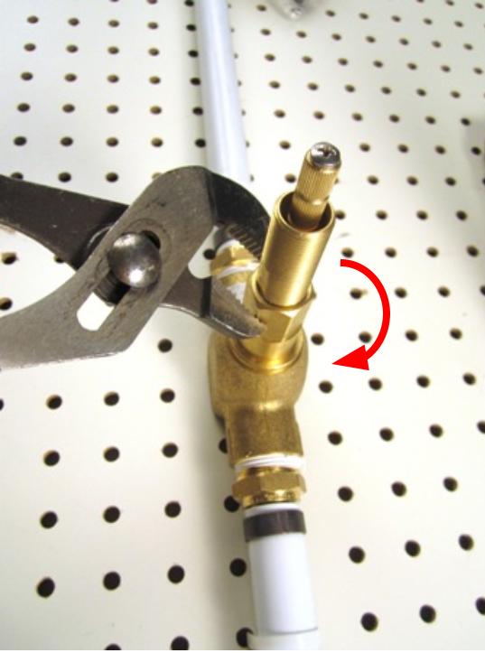 Place the cartridge in the faucet body and using the socket wrench or adjustable pliers, turn clockwise to screw the cartridge into the faucet body. In order to avoid over tightening the cartridge, hand tighten the cartridge, and then use the adjustable pliers to apply a quarter turn. Approximately 10-14 lbs of torque are required to properly install the cartridge.
