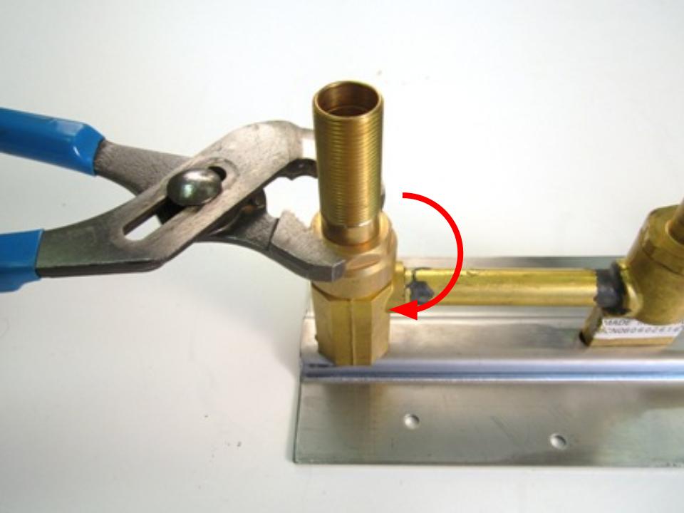 Re-install the locking nut with a pair of adjustable pliers. In order to avoid over tightening the locking nut, hand tighten the locking nut, and then use the adjustable pliers to apply a quarter turn. Approximately 10-14 lbs of torque are required to properly install the locking nut.