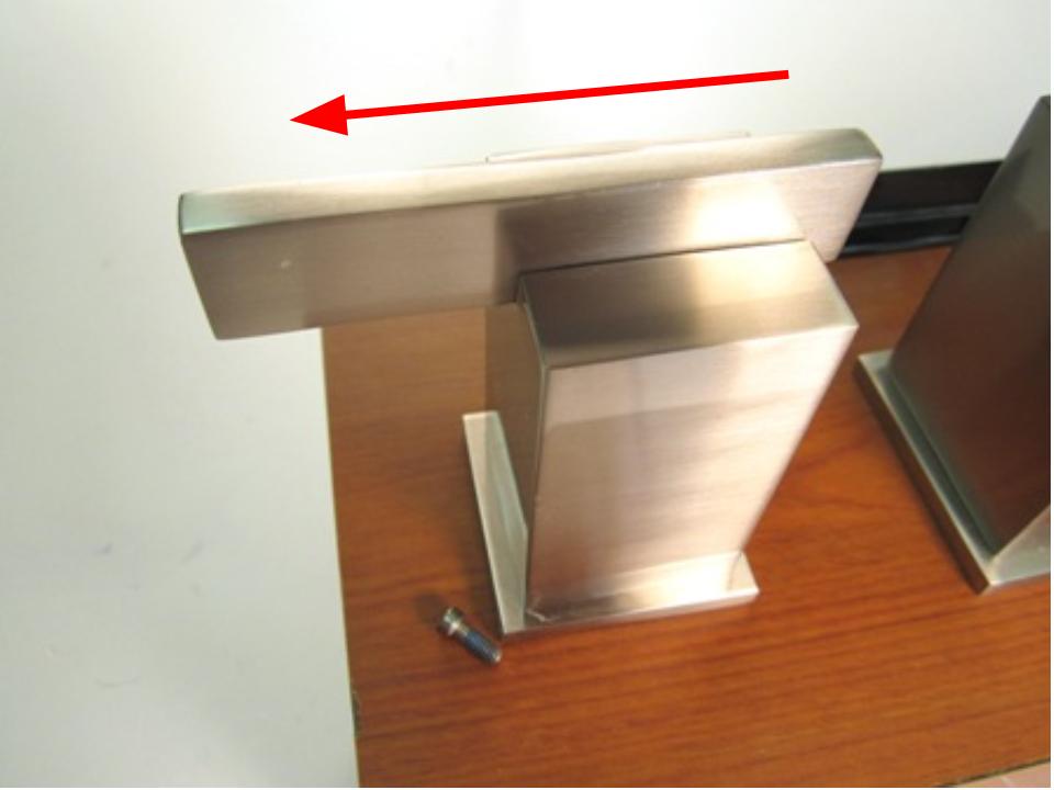 Finally, slide the handle base away from the spout base.