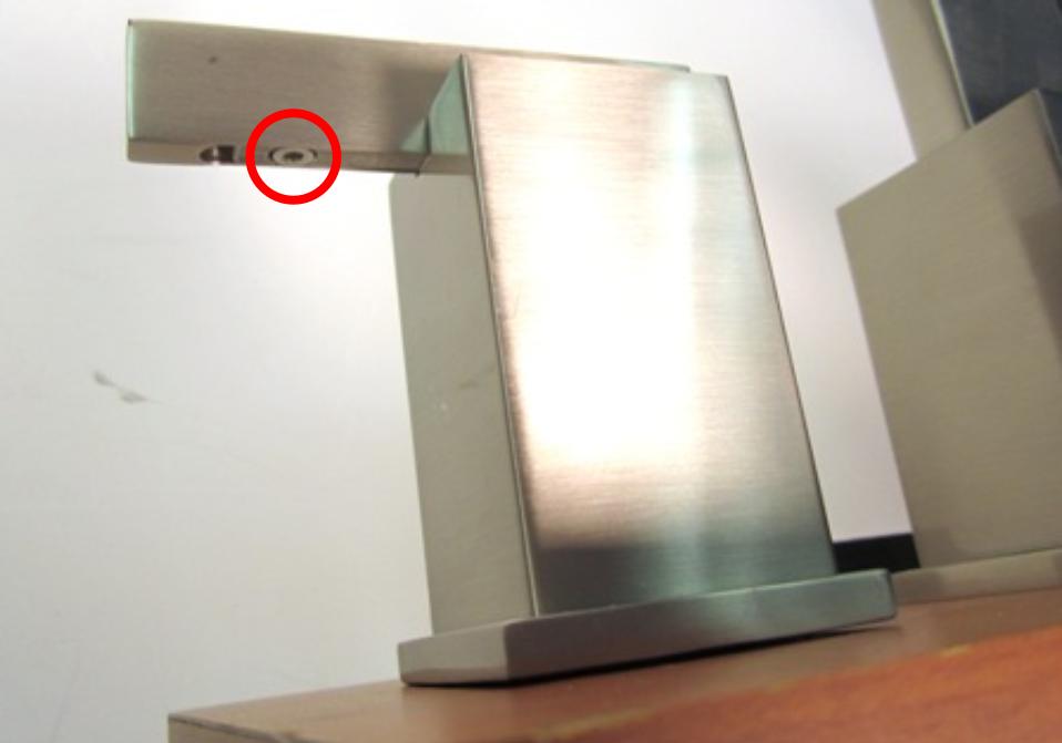 To remove the handle stem, locate the set screw that attaches the handle stem to the handle base.
