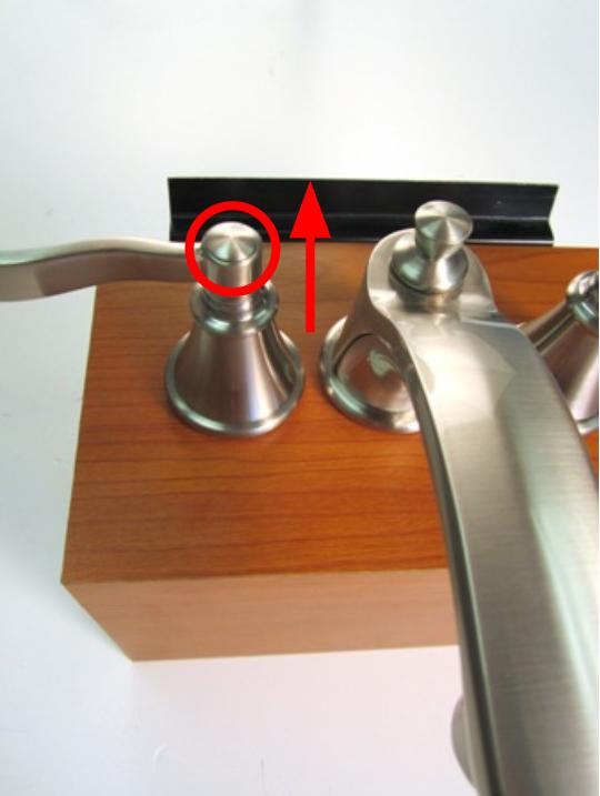 If the handle cap does not uncrew, use a flat-head screwdriver to remove the handle cap.
