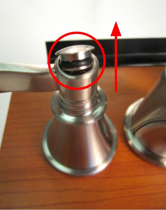 If the handle cap does not uncrew, use a flat-head screwdriver to remove the handle cap. 