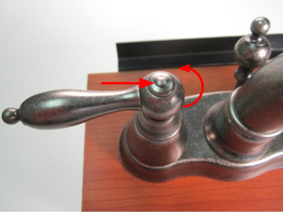 Remove the handle cap. To do so, uncrew the handle cap counter clockwise.